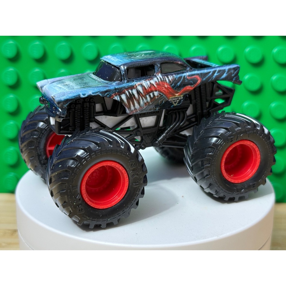 Monster Jam Marvel Venom Monster Truck Diecast Blue Black 1:64 Scale BKT Tires
